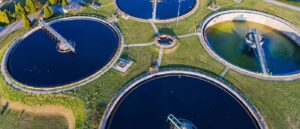 Pace Analytical PFAS Analysis. Birds eye view of Modern industrial sewage treatment plant.